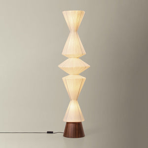 Greendale Floor Lamp in aged brass shown from the front to reveal the stem, base, and shade proportions.