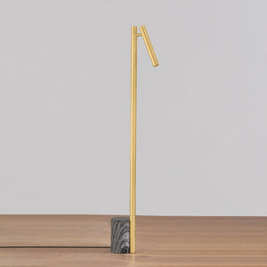Circleville Floor Lamp in aged brass shown from the front to reveal the stem, base, and shade proportions.