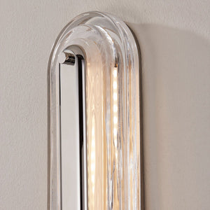 Close-up of the Litton Wall Sconce 5.75" x 28" in polished nickel showing the arm curve and shade silhouette.