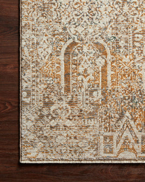 Side view of the Lourdes Ivory / Orange rug.
