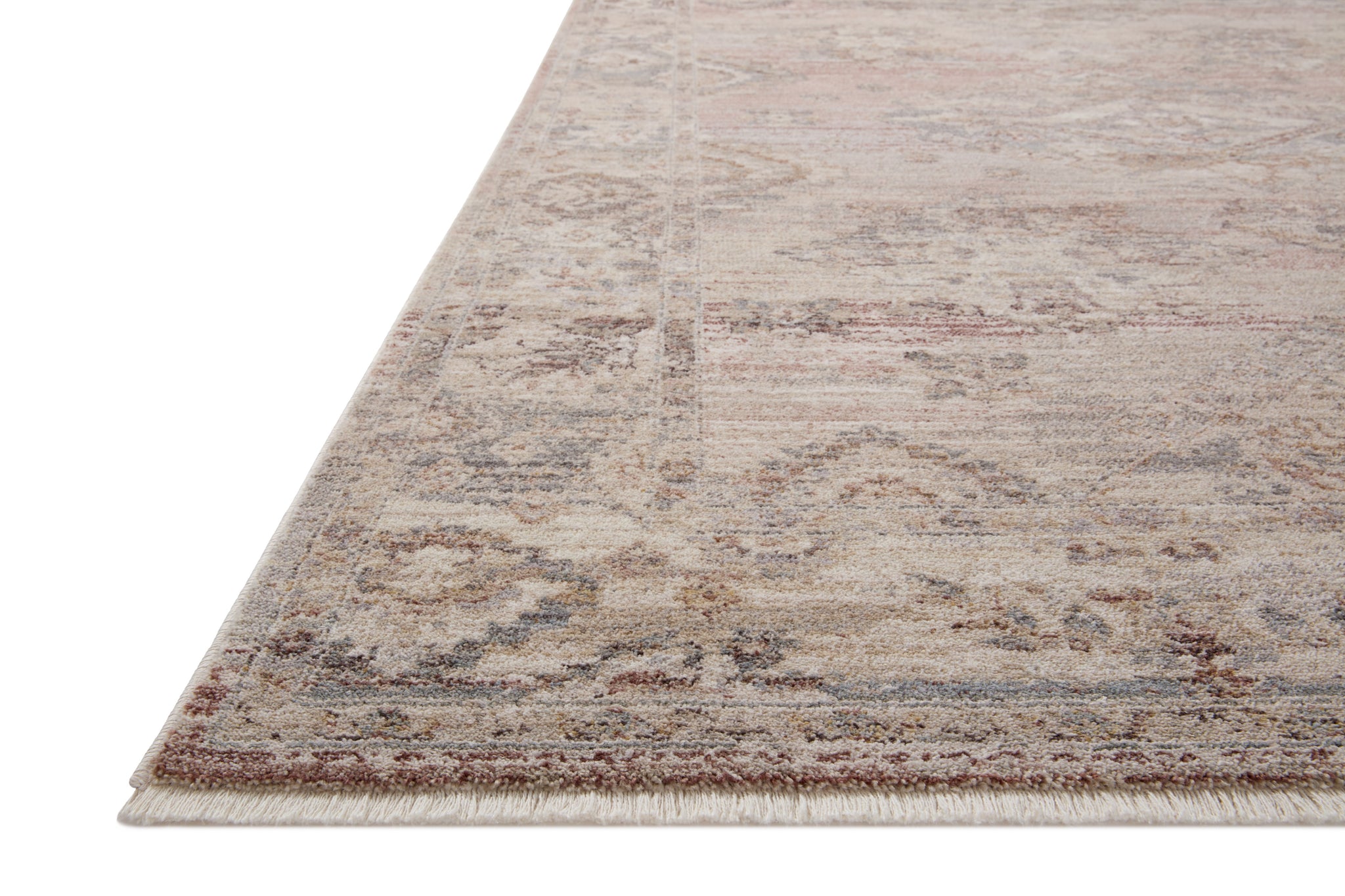 Side view of the Lyra Blush / Dove rug.