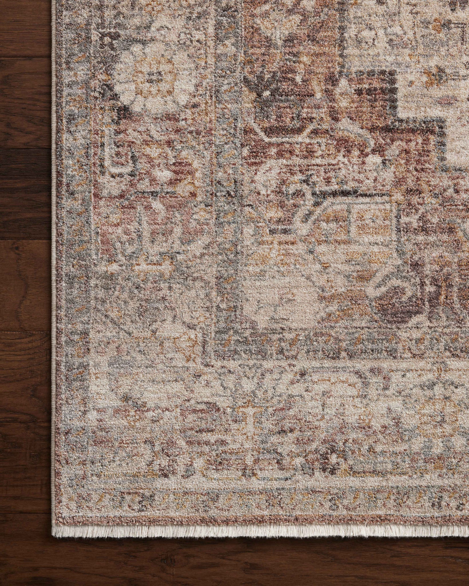 Side view of the Lyra Berry / Stone rug.