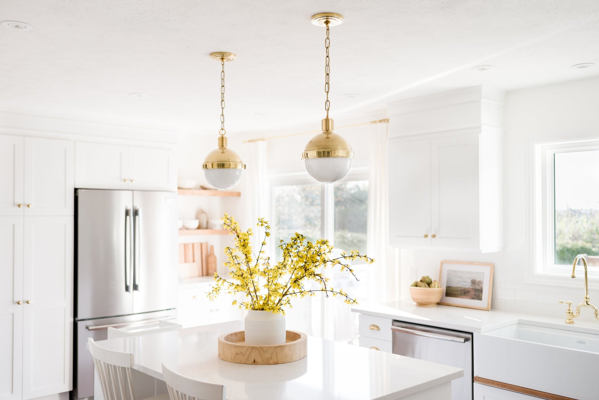 Lambert Pendant 9.5" in aged brass styled in an elegant dining room for warm, layered light at Laurie Yapp Home.