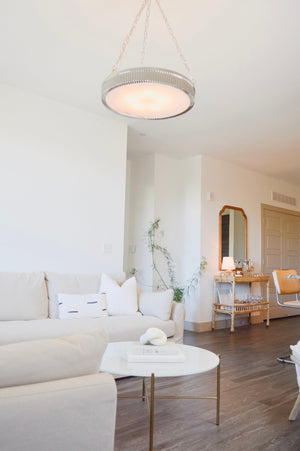 Lynden Chandelier 22" in polished nickel styled in an elegant dining room for warm, layered light at Laurie Yapp Home.