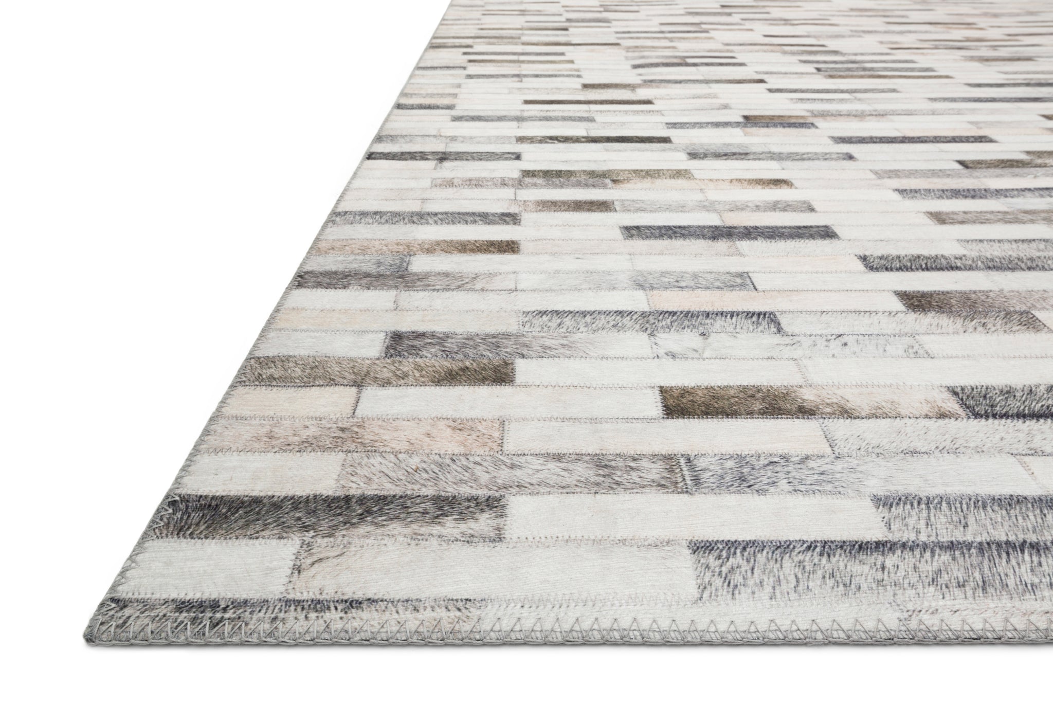 Maddox Ivory / Grey shown from a different angle to reveal its pattern.