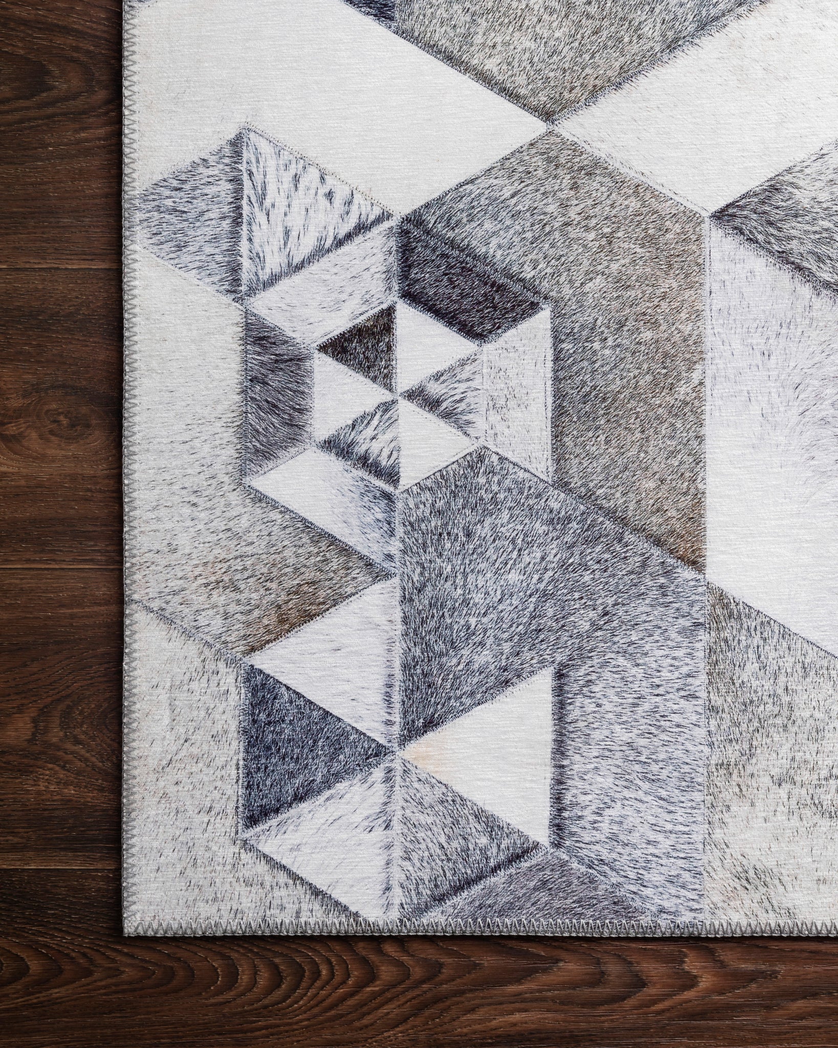 Maddox Grey / Ivory shown from a different angle to reveal its pattern.