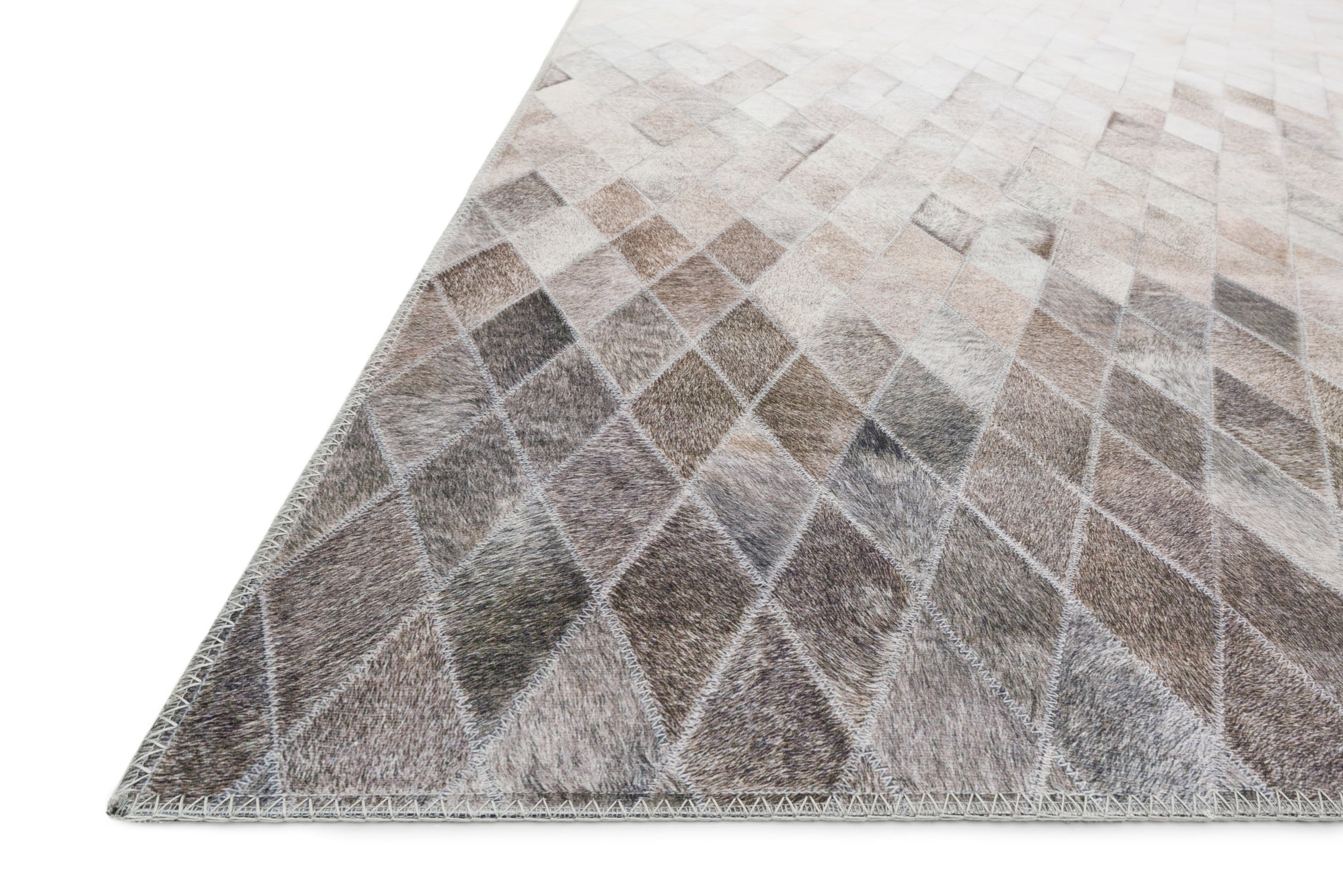 Maddox Sand / Taupe shown from a different angle to reveal its pattern.