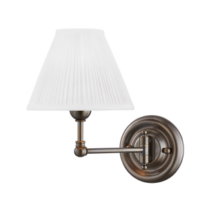 Classic No.1 Wall Sconce 7.5" x 10.5" in Aged Brass shown from a second angle to highlight the arm curve and shade silhouette.