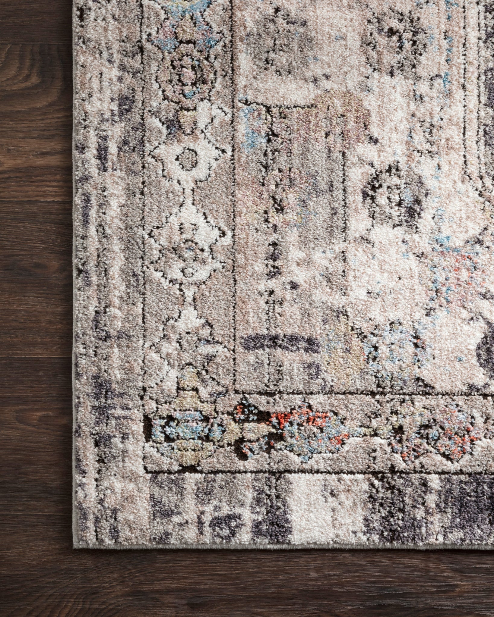 Side view of the Medusa Natural / Stone rug.
