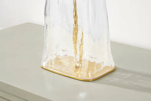 Midura Table Lamp in aged brass shown from a second angle to highlight the base and shade proportions.