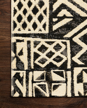 Close-up detail of the Mika Ivory / Black showing its pile and weave.