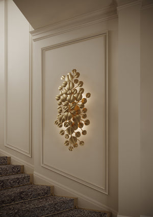 Menorca Wall Sconce styled in a modern bathroom for warm, layered light at Laurie Yapp Home.