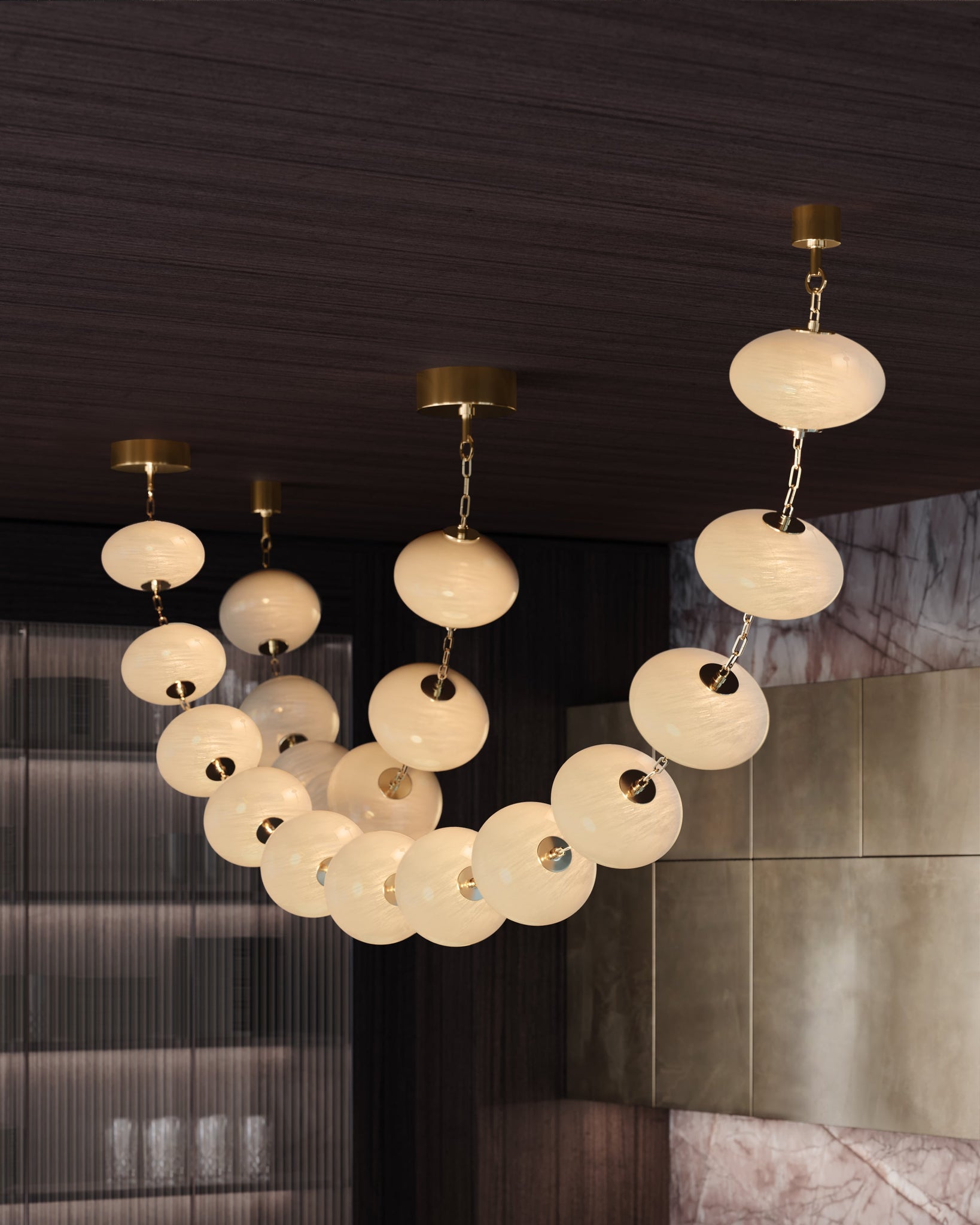 Nephele Chandelier 10" x 44" styled in a formal living room for warm, layered light at Laurie Yapp Home.