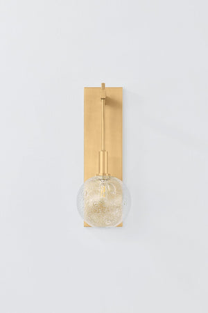 Onteora Wall Sconce in aged brass shown from the front to reveal the arm curve and shade silhouette.