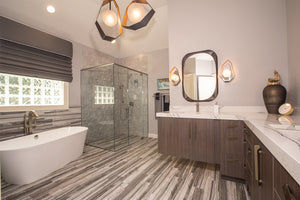 Origami Wall Sconce 9.25" x 14.5" styled in a curated living room for warm, layered light at Laurie Yapp Home.