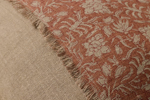 Orange / Natural Pillow shown from a different angle to reveal its pattern.