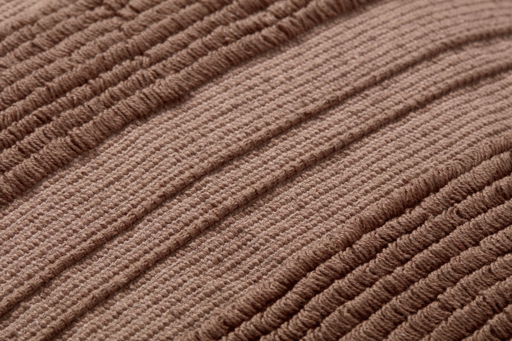 Kristy Clay Pillow shown from a different angle to reveal its pattern.