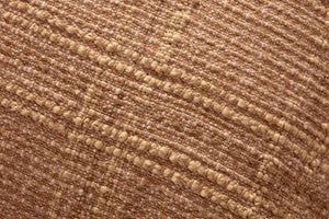 Calista Terracotta Pillow shown from a different angle to reveal its pattern.