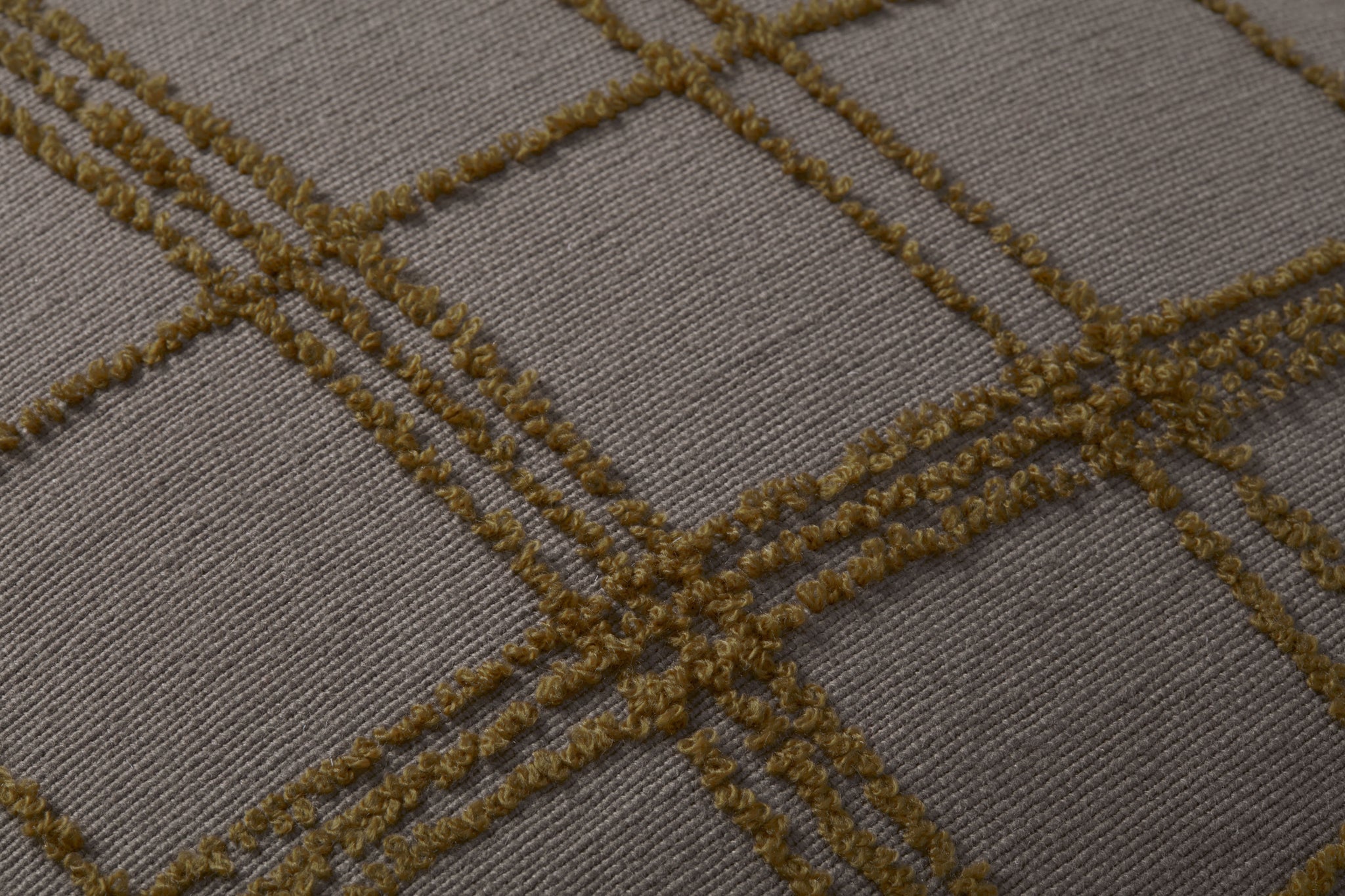 Edward Charcoal / Olive Pillow shown from a different angle to reveal its pattern.