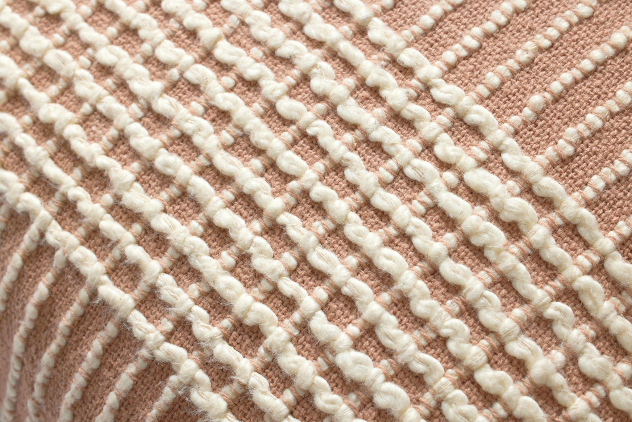Sophia Blush Pillow shown from a different angle to reveal its pattern.