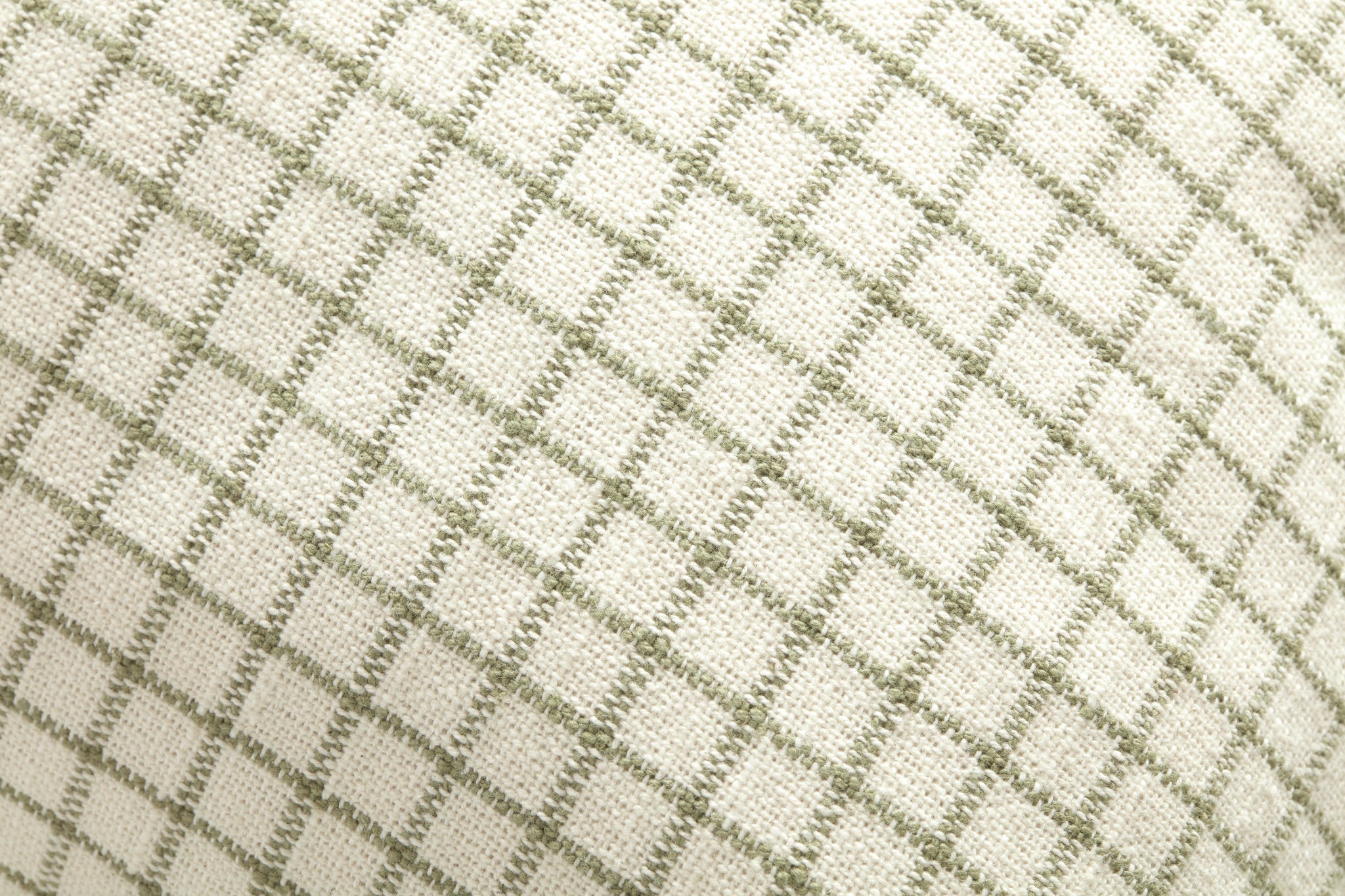 Dinah Ivory / Moss Pillow shown from a different angle to reveal its pattern.