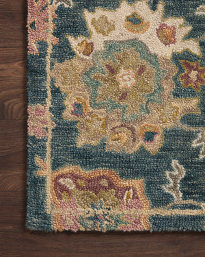 Side view of the Padma Navy / Multi rug.