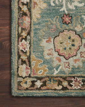Side view of the Padma Teal / Multi rug.