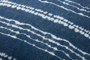 Indigo / Ivory Pouf shown from a different angle to reveal its pattern.
