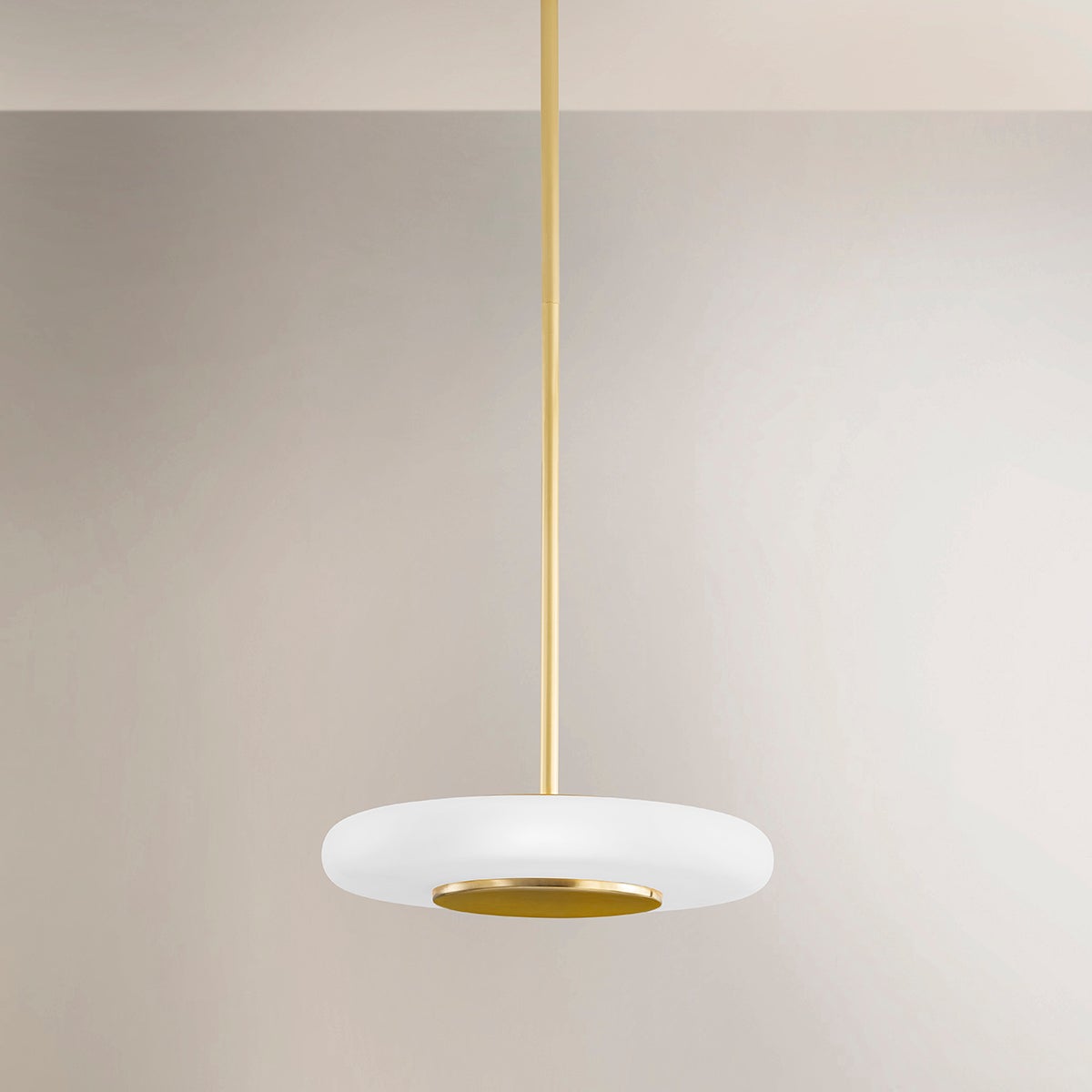 Close-up of the Blyford Pendant 15.5" in aged brass showing the shade shape and metal detail.