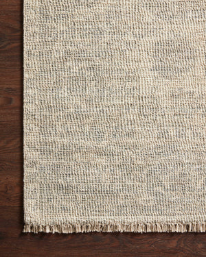 Side view of the Priya Ivory / Grey rug.