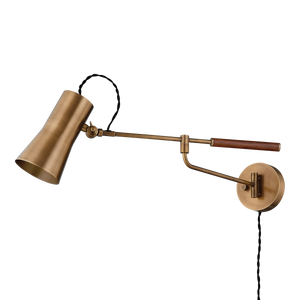 Novel Plug-In Sconce shown from a second angle to highlight the arm profile and shade silhouette.