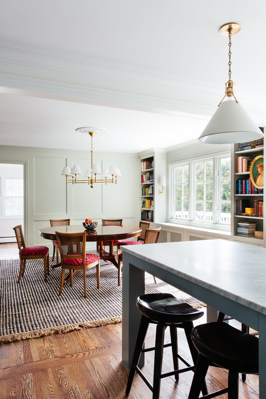 Classic No.1 Chandelier in aged brass styled in a formal living room for warm, layered light at Laurie Yapp Home.