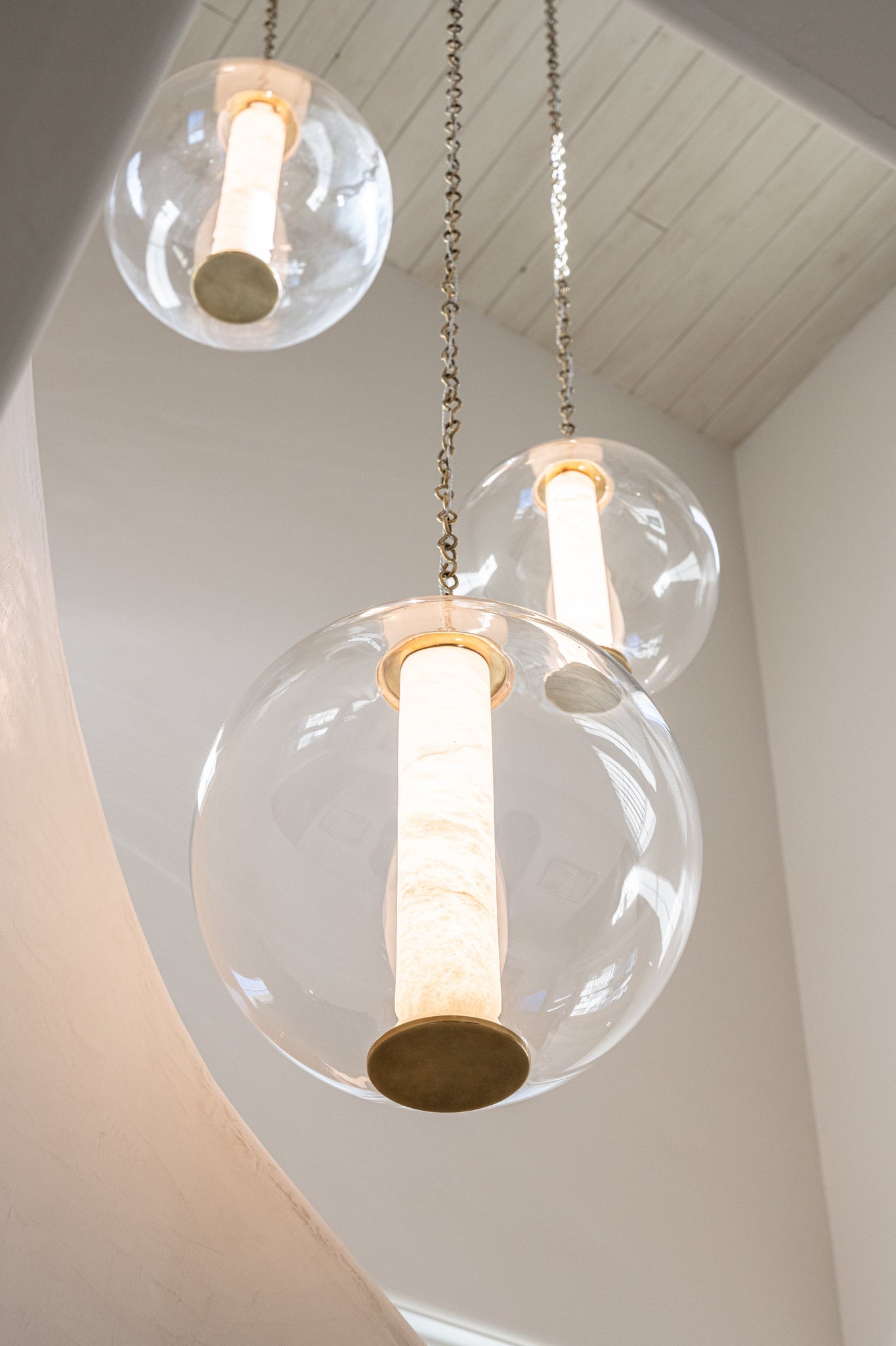 Pietra Pendant 16" styled in a bright kitchen for warm, layered light at Laurie Yapp Home.