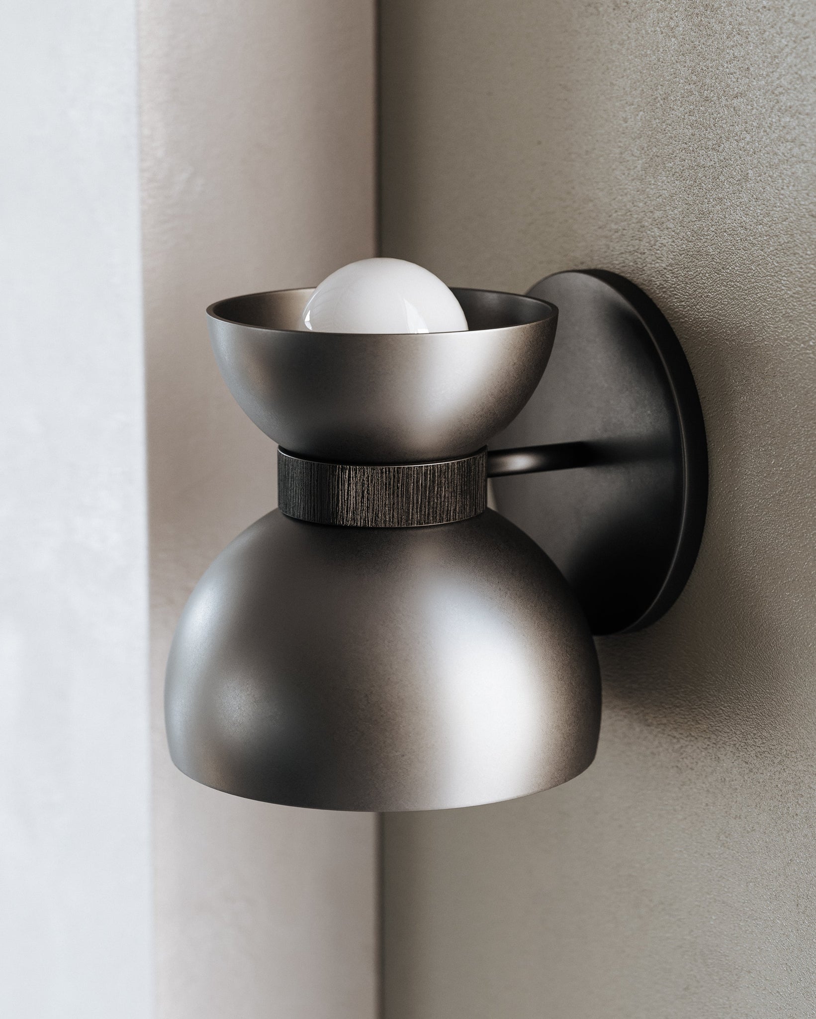 Pomona Wall Sconce styled in a curated living room for warm, layered light at Laurie Yapp Home.