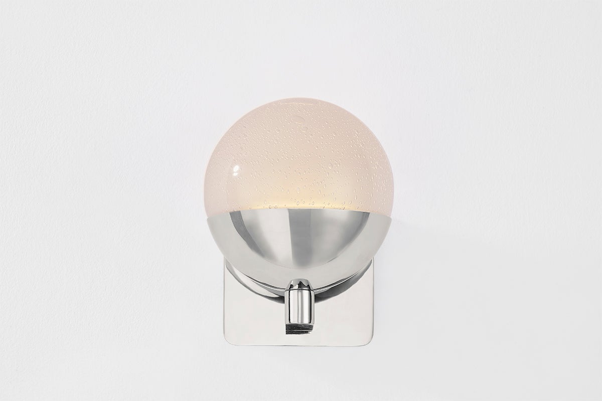 Close-up of the Rochford Wall Sconce in polished nickel showing the arm curve and shade silhouette.