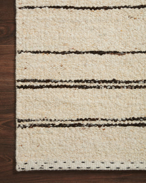 Side view of the Roman Natural / Charcoal rug.