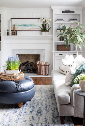 Ridgewood Picture Light 16.5" in dark bronze styled in a reading room for warm, layered light at Laurie Yapp Home.