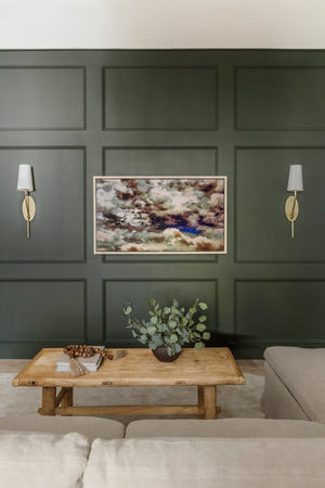 Rutland Wall Sconce 5" in aged brass styled in a warmly lit hallway for warm, layered light at Laurie Yapp Home.