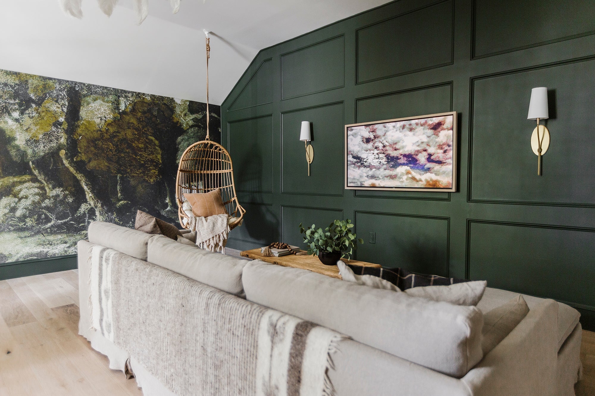 Rutland Wall Sconce 5" in aged brass styled in a curated living room for warm, layered light at Laurie Yapp Home.