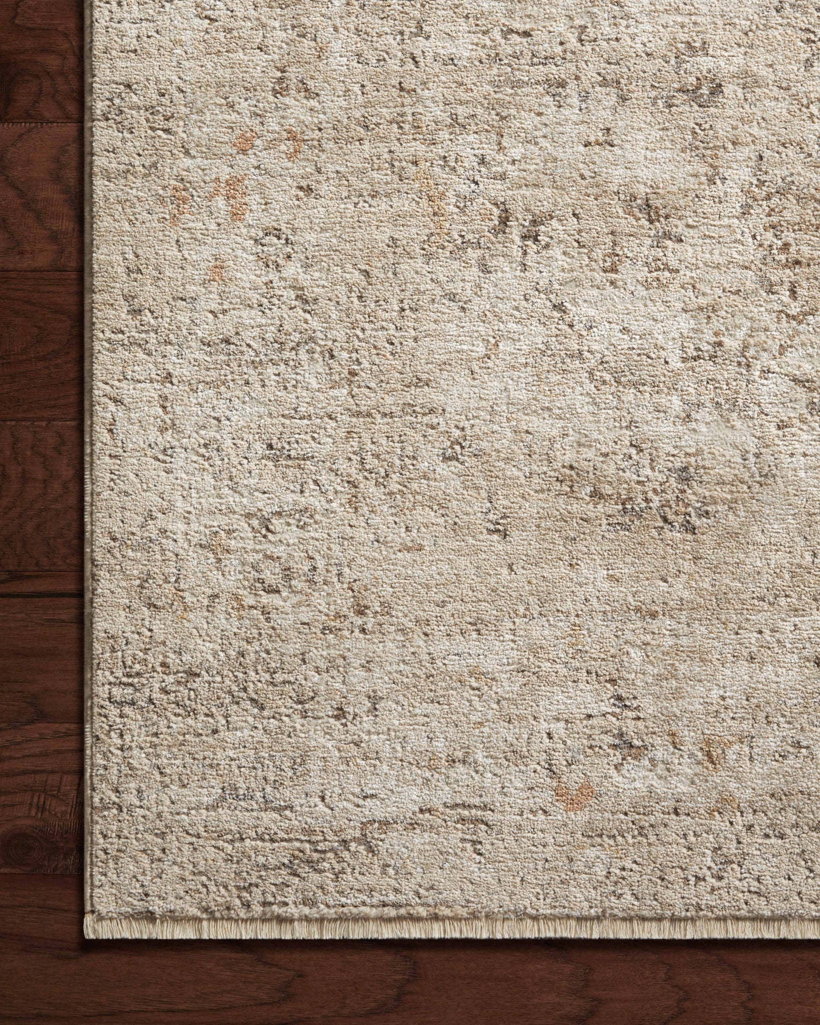 Side view of the Sonnet Sand / Taupe rug.
