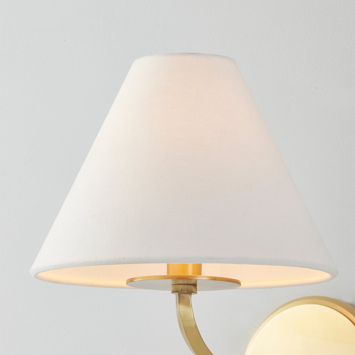 Stacey Wall Sconce in aged brass — a Hudson Valley wall sconce for bathrooms, hallways, and living rooms at Laurie Yapp Home.