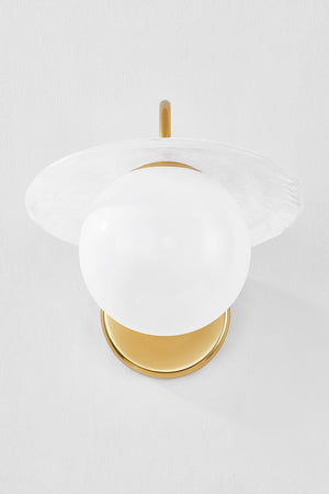 Stampford Wall Sconce in aged brass shown from a second angle to highlight the arm curve and shade silhouette.