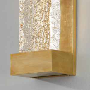 Close-up of the Wharton Wall Sconce 5" x 15" in aged brass showing the arm curve and shade silhouette.