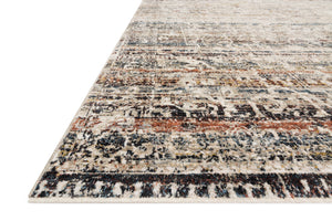 Side view of the Theia Taupe / Multi rug.