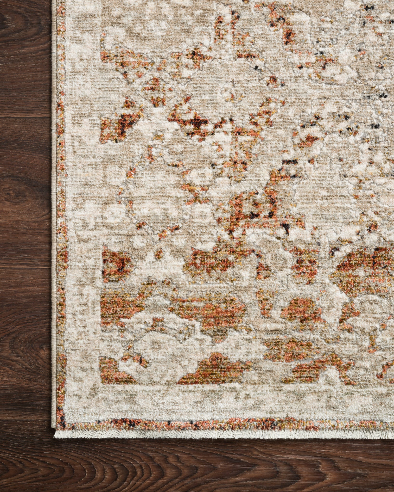 Close-up detail of the Theia Natural / Rust showing its pile and weave.