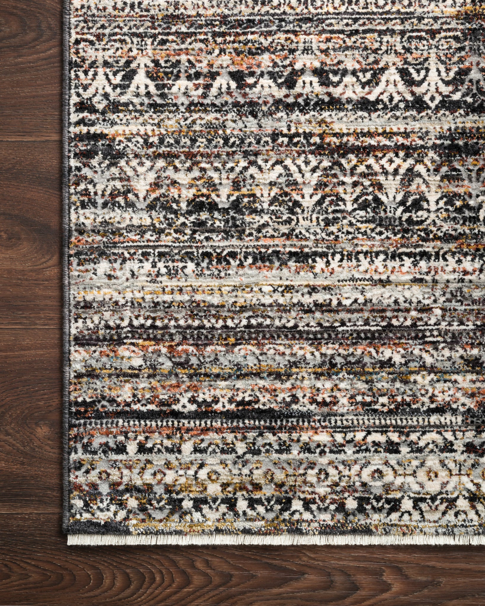 Close-up detail of the Theia Grey / Multi showing its pile and weave.