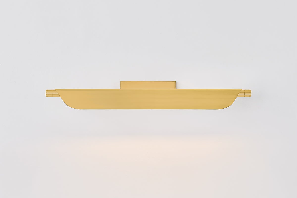Tinwald Picture Light 27" in aged brass — a Hudson Valley picture light for gallery walls and reading nooks at Laurie Yapp Home.