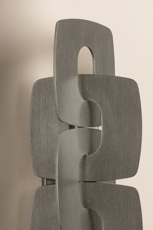 Close-up of the Trentino Wall Sconce showing the arm curve and shade silhouette.