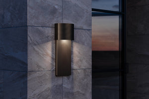 Tempe Exterior Wall Sconce 6.75" x 17" styled in a modern bathroom for warm, layered light at Laurie Yapp Home.