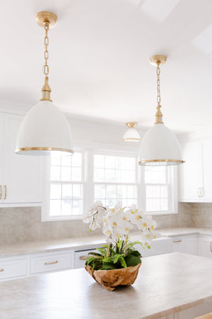 Close-up of the Randolph Semi Flush in aged brass showing the shade profile and mounting canopy.